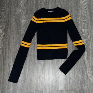 Black fitted knit sweater with yellow stripes